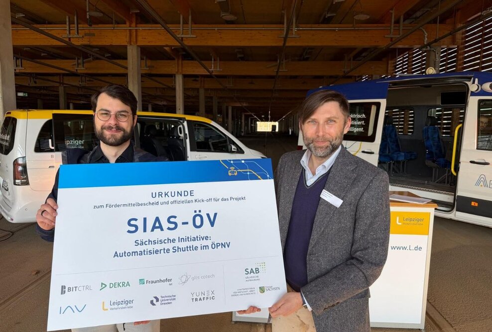 Ruslan Hrushchak, Geschäftsführer von BitCtrl (rechts), und Tobias Scheuer, Team Lead (links)