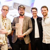 DIO Studios und Plastic2Beans bei der Übergabe des Green Product Award