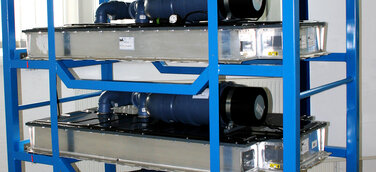 Die Wiederverwendung von gebrauchten Elektrofahrzeug-Batterien in stationären Anwendungen.