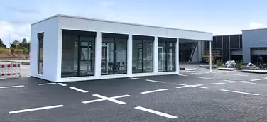 Kuhn+Witte aus Seevetal lässt neuen AudiGWplus Verkaufspavillon für das Audi Zentrum Harburg von Hacobau GmbH aus Hameln bauen