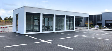 Kuhn+Witte aus Seevetal lässt neuen AudiGWplus Verkaufspavillon für das Audi Zentrum Harburg von Hacobau GmbH aus Hameln bauen