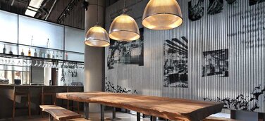 Boxenstopp auf der FESPA 2020: Neschen präsentiert Messestand als Fahrradcafé