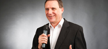 Rednermacher Heinrich Kürzeder spricht auf der GSA Convention