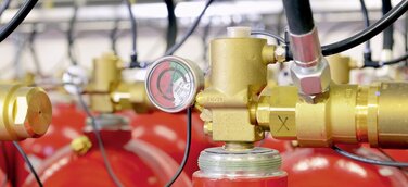 Nachhaltigkeit bei Minimax: Mehrwegflaschen für Gaslöschanlagen