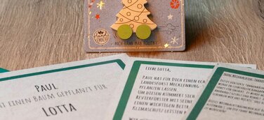 Baumpflanzzertifikate und kleines Geschenk 