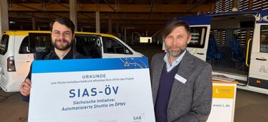 Ruslan Hrushchak, Geschäftsführer von BitCtrl (rechts), und Tobias Scheuer, Team Lead (links)