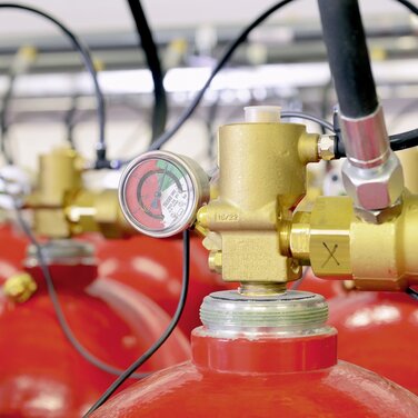Nachhaltigkeit bei Minimax: Mehrwegflaschen für Gaslöschanlagen