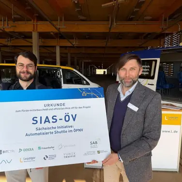 Ruslan Hrushchak, Geschäftsführer von BitCtrl (rechts), und Tobias Scheuer, Team Lead (links)