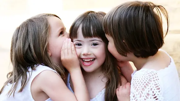 Schon ab dem Säuglingsalter fördern: Ergotherapeuten betreuen Kinder mit Down-Syndrom und deren Eltern